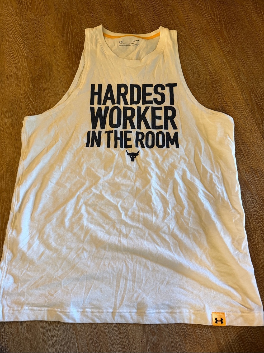 Under Armour White Tank Top with Black Text - "Hardest Worker In The Room"